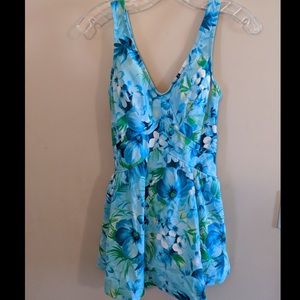 Skirted one piece bait hung suit